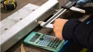 Mechanical estimator reviewing HVAC shop drawings
